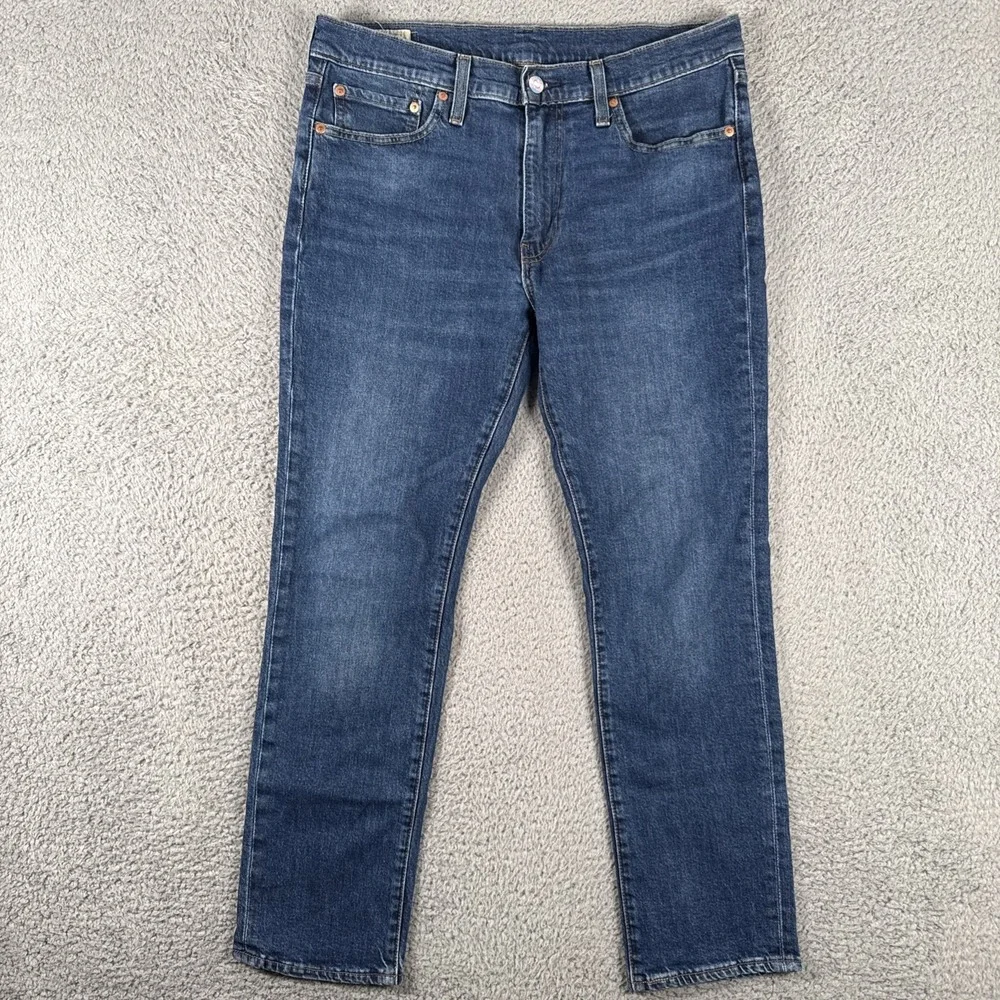 Levi's Slim Straight Dark Blue Jeans with Trans Pride Patch
